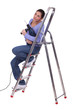 Handywoman sat on a ladder
