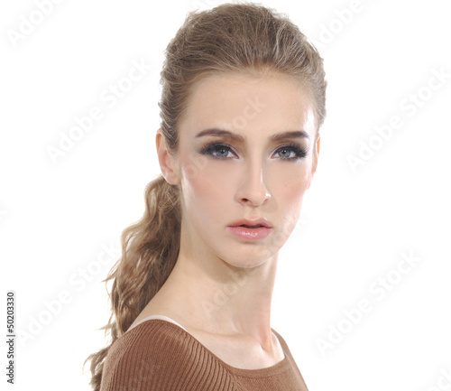Photo: Young blond woman with curly blond hair posing Young blond woman with curly blond hair posing