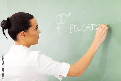 Photo: educator writing sex education on chalkboard educator writing sex education on chalkboard