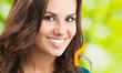 Young woman with salad, outdoors