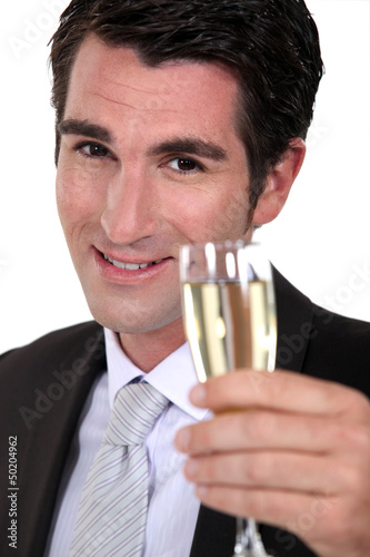 Photo: businessman drinking champagne businessman drinking champagne