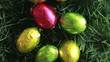 Easter eggs packed in aluminium in the grass