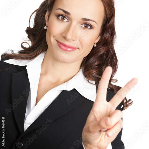 Photo: Woman showing two fingers, isolated Woman showing two fingers, isolated