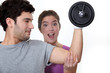 Man showing off in front of his girlfriend.