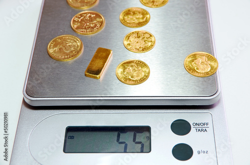 Photo: gold bar scales gold bar scales