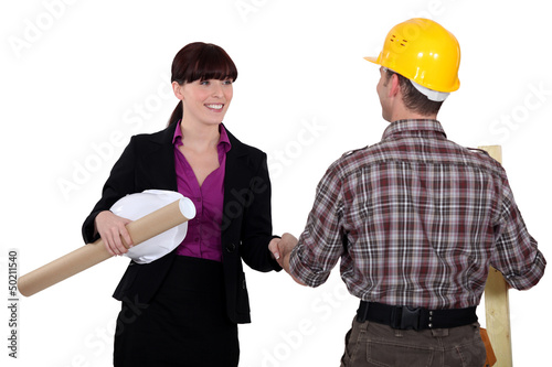 Photo: Businesswoman greeting a colleague Businesswoman greeting a colleague