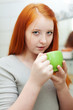    red-haired teen girl gargling throat