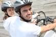 Couple on bicycle