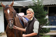 Blonde girl with horse