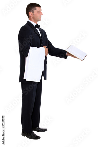 Photo: Waiter showing menu Waiter showing menu