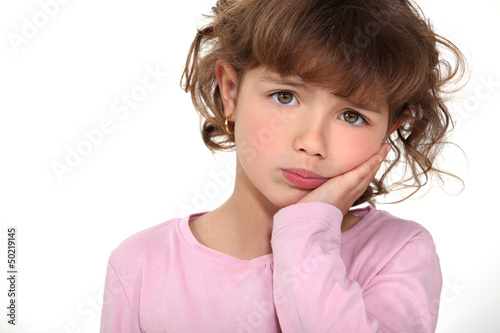 Photo: Cute little girl pouting Cute little girl pouting