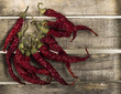 Pepper on wooden background