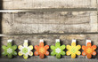 Flowers on wooden background