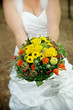 Photo: Woman with a Wedding Bouquet Woman with a Wedding Bouquet