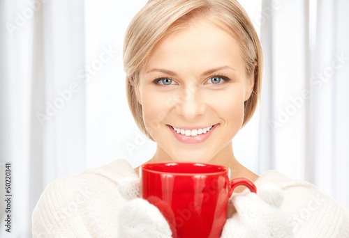 Photo: woman with red mug woman with red mug