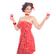 Photo: Junge Frau im Pin Up Style mit Cupcake blickt fern Junge Frau im Pin Up Style mit Cupcake blickt fern