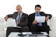 Businessmen working together in presentation
