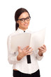 Young woman reading magazine
