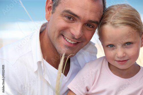 Photo: Father and daughter on a beach Father and daughter on a beach