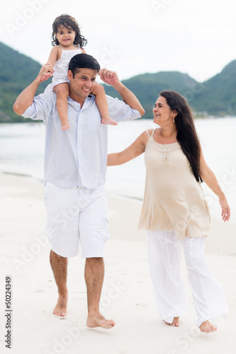 Photo: Happy family at the beach Happy family at the beach