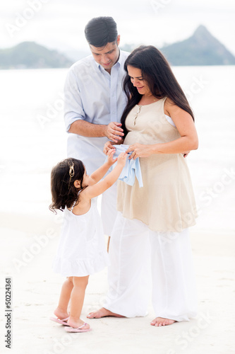 Photo: Girl excited about her coming sister Girl excited about her coming sister