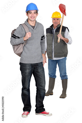Photo: Manual worker with apprentice Manual worker with apprentice