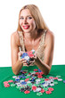Woman in casino playing cards