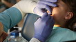 dentist treats teeth child