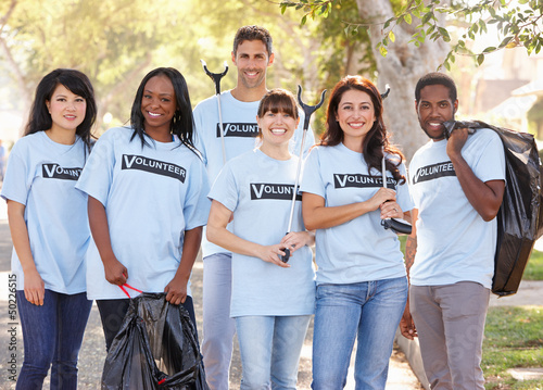 Photo: Team Of Volunteers Picking Up Litter In Suburban Street Team Of Volunteers Picking Up Litter In Suburban Street
