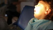 dentist treats teeth child