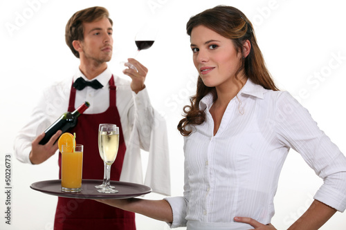 Photo: Wine waiter and waitress Wine waiter and waitress
