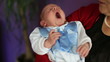 newborn baby with grandmother