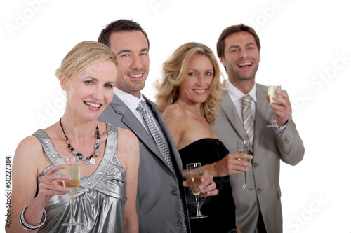 Photo: Two couples celebrating Two couples celebrating