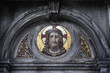 Sculpture mosaic of Jesus Christ on the monument in the cemetery