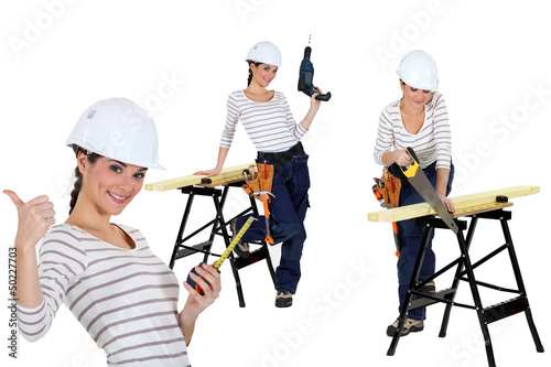 Photo: Confident woman using a workbench Confident woman using a workbench