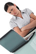 Woman pouting in front of her computer
