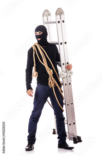 Photo: Burglar wearing balaclava isolated on white Burglar wearing balaclava isolated on white