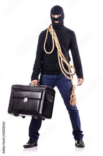 Photo: Burglar wearing balaclava isolated on white Burglar wearing balaclava isolated on white