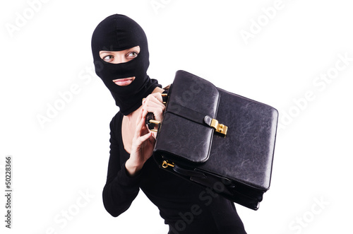Photo: Industrial espionage concept with person in balaclava Industrial espionage concept with person in balaclava