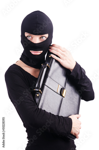Photo: Industrial espionage concept with person in balaclava Industrial espionage concept with person in balaclava