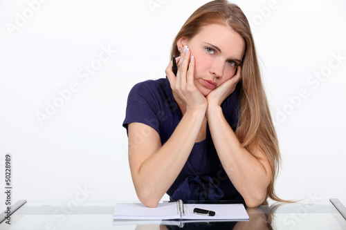 Photo: Woman writing in her diary Woman writing in her diary