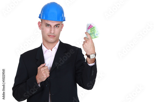 Photo: businessman holding money businessman holding money