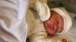 newborn in hospital room