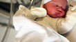 newborn in hospital room