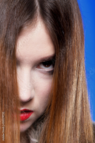 Photo: Woman shiny straight long hair and make-up Woman shiny straight long hair and make-up