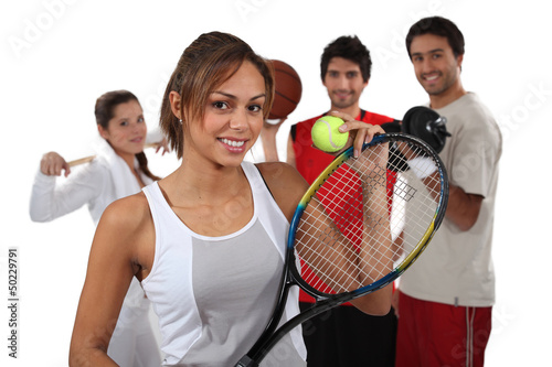 Photo: Teenagers dressed for different sports Teenagers dressed for different sports