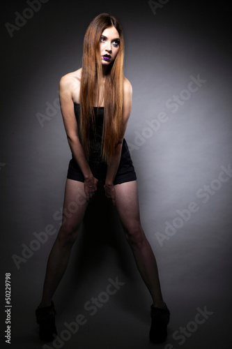 Photo: Woman straight long hair make-up posing Woman straight long hair make-up posing