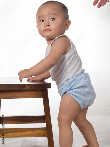 Photo: baby learning to stand baby learning to stand
