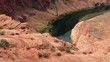 Girl on the edge of the cliff at Horseshoe Bend. Arizona, USA.