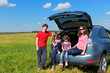 Family car trip on vacation, happy parents travel with kids